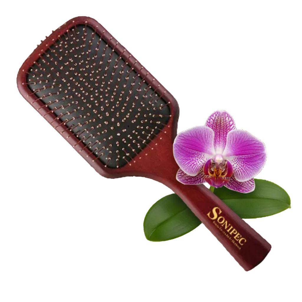 Orchid hairbrush with orchid flower