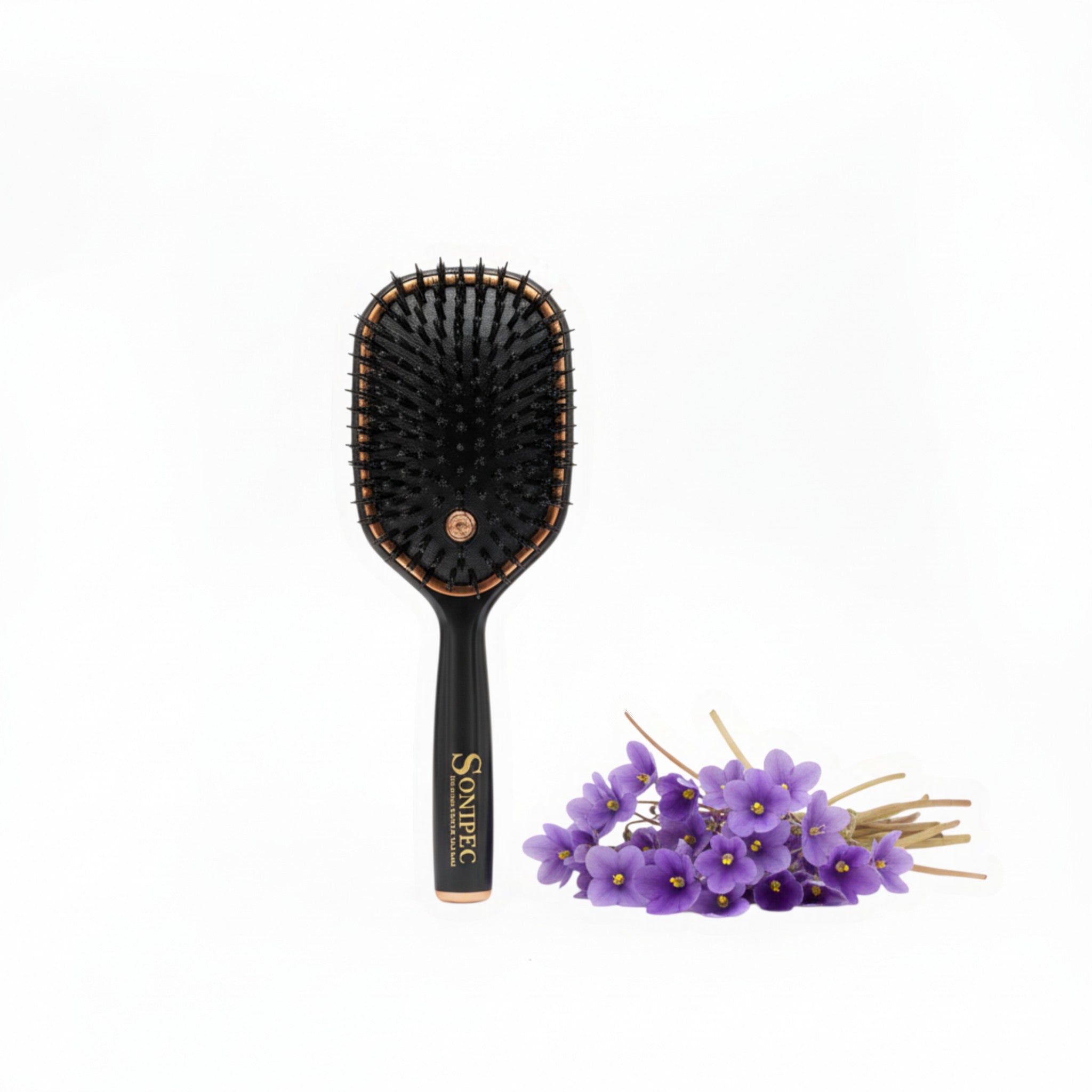 SONIPEC Violet hairbrush with black bristles and rose gold accents, displayed next to a bunch of fresh purple violets.